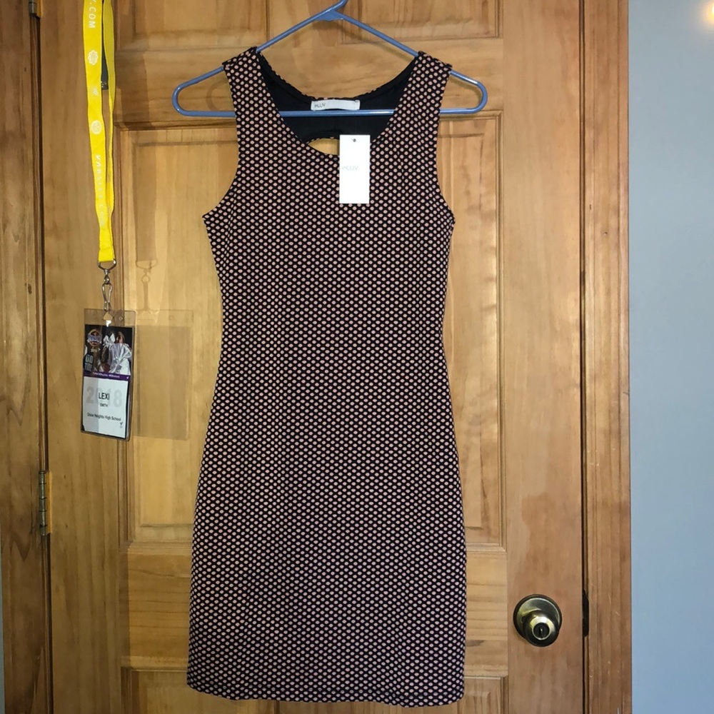 A tight polka dot dress